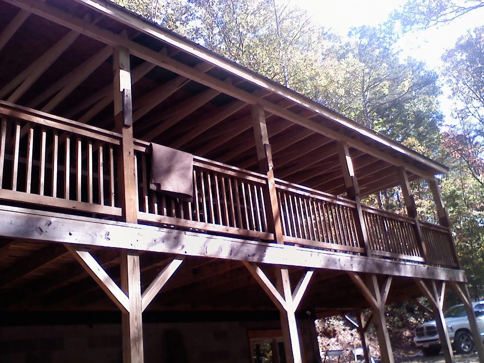 Timber framing under a new elevated porch and deck — Roof Leak Repair in Goodspring by Roofing Brothers